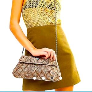 Raga embellished cora clutch bag